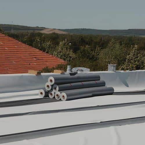 rolls of PVC membrane on a roofing system